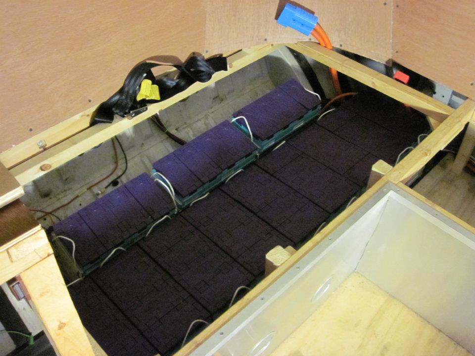 Can fit all 48 cells under the rear seat, some welding required to re-arrange the mounting rack.