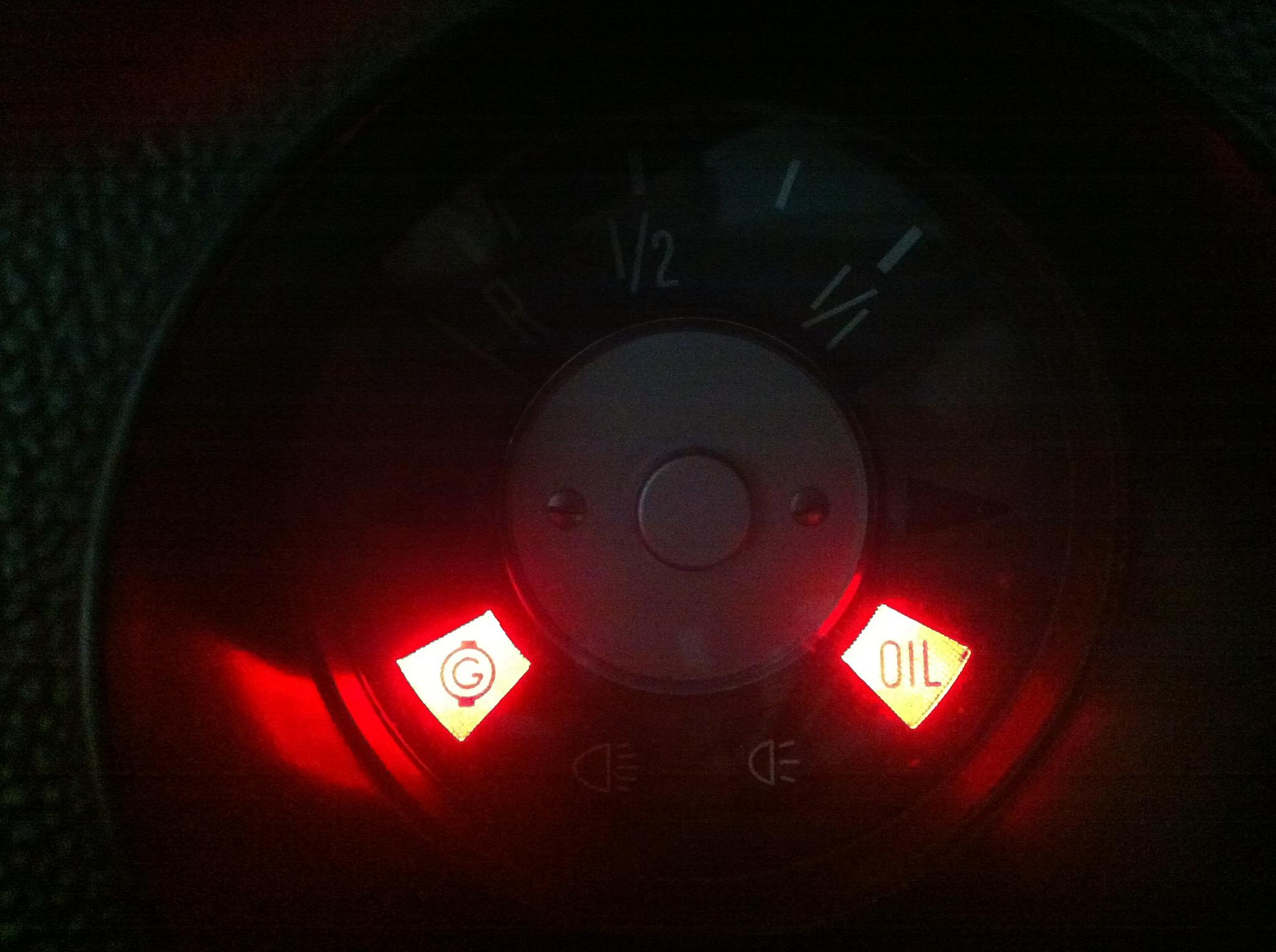 Retro'd the warning circuit from the battery management to the "Generator" light on the dash. Note "Oil" is already connected to the motor overheat circuit.